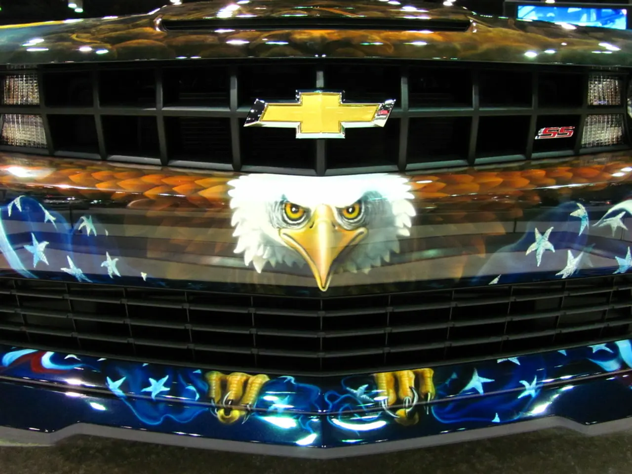 In the image we can see a vehicle and there is a design of an animal on the vehicle. Here we can...