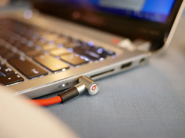 Power adapter yet plugged into the outlet.